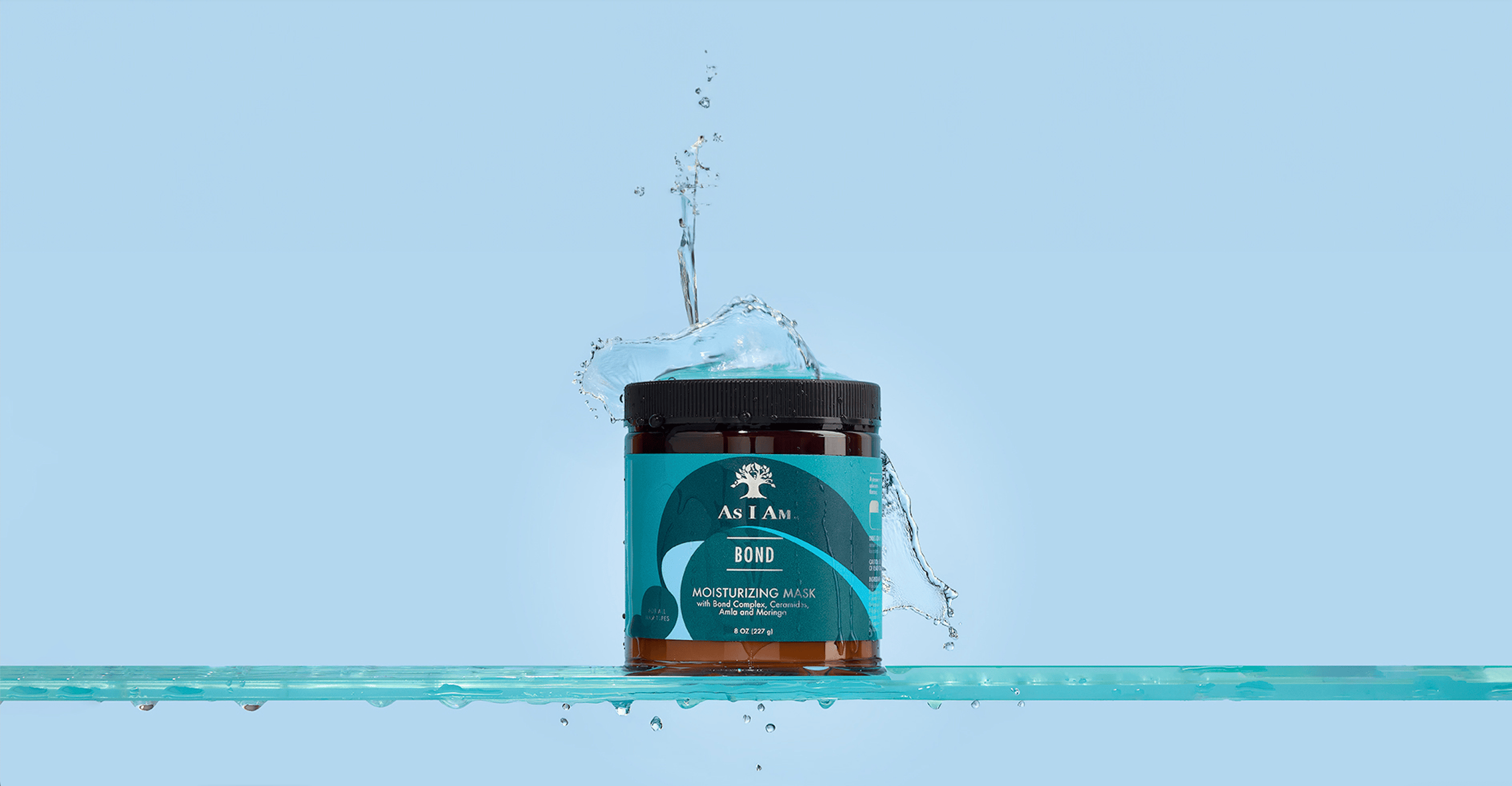 As I Am Bond Mask – a rich, creamy hair treatment in a sleek beige jar, designed to deeply repair and strengthen damaged curls and coils.