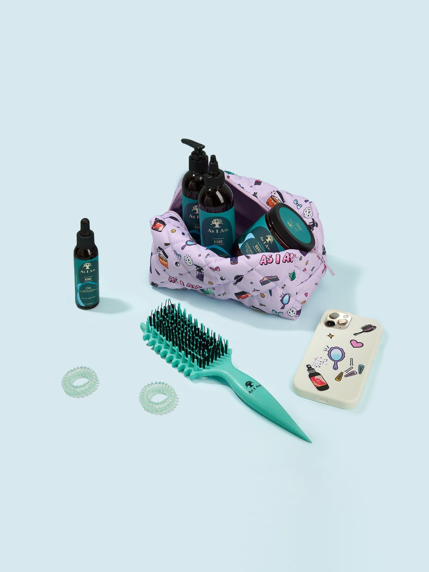 Cosmetic bag with hair care products and tools on a light blue background