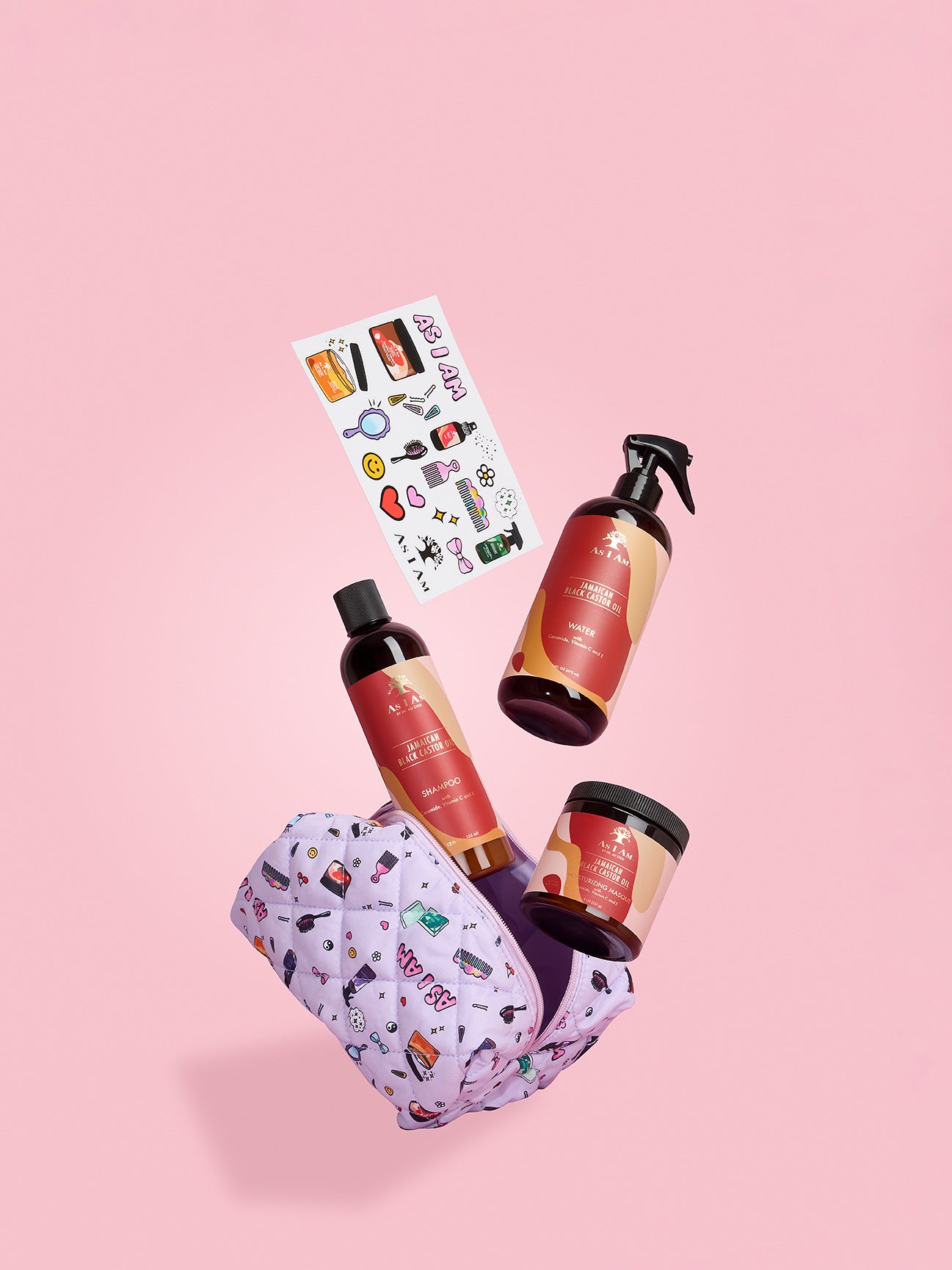 As I Am Jamaican Black Castor Oil set — includes a product pouch and branded stickers, offering a fun and functional bundle for strengthening and styling natural curls.