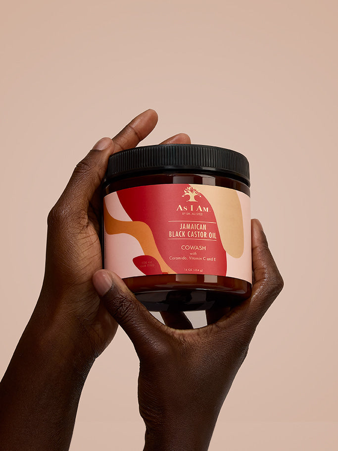 As I Am Jamaican Black Castor Oil Smoothie — portrait image of the curl-defining cream held in hand, featuring the rich, nourishing formula designed to hydrate, smooth, and enhance natural curls with JBCO.
