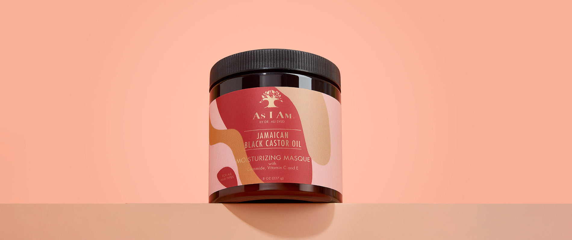 As I Am Jamaican Black Castor Oil Hair Mask — landscape image of the deep conditioning treatment designed to strengthen, hydrate, and repair damaged curls with nutrient-rich JBCO.