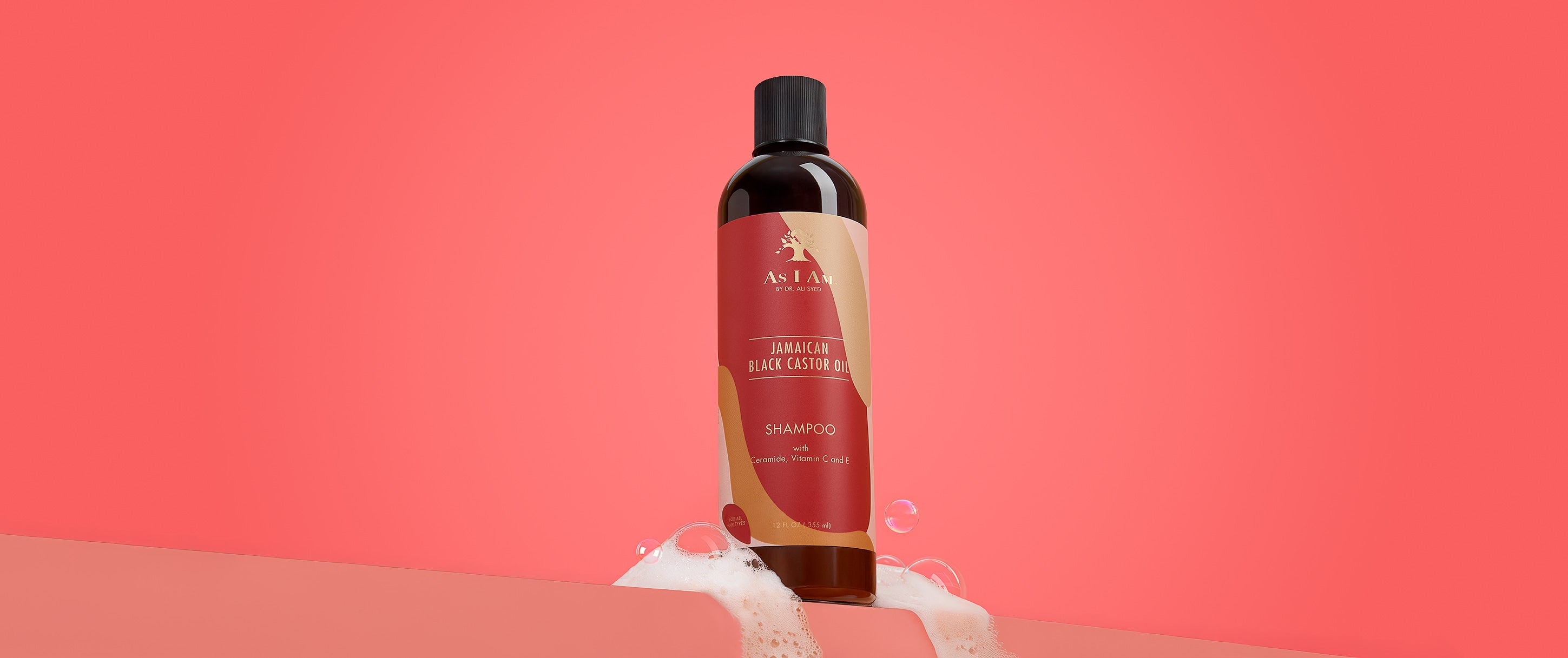 As I Am Jamaican Black Castor Oil Shampoo — landscape image of the nourishing shampoo formulated to gently cleanse, strengthen, and support healthy hair growth.