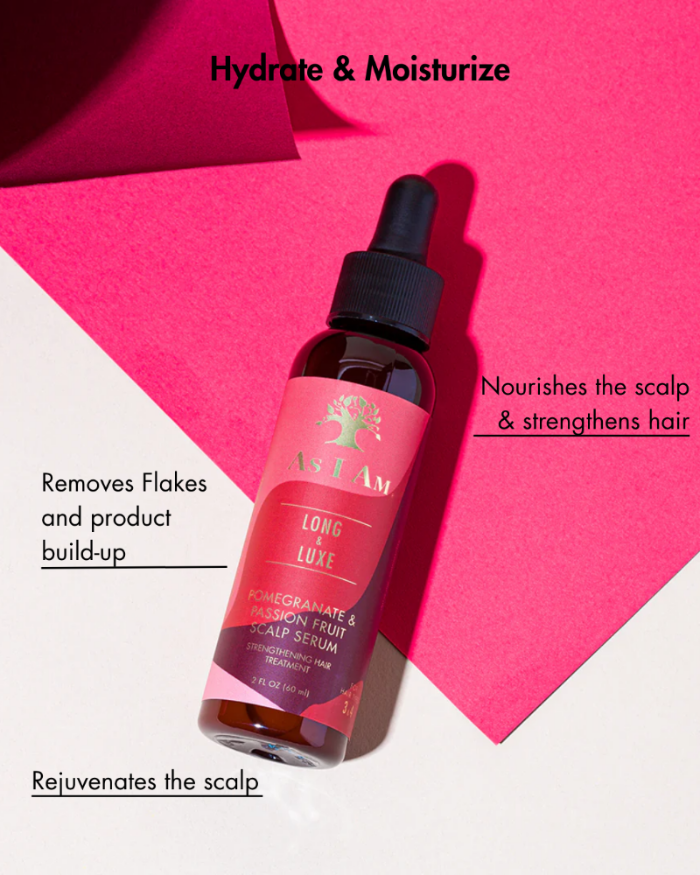 Bottle of scalp serum with pink label on a pink background
