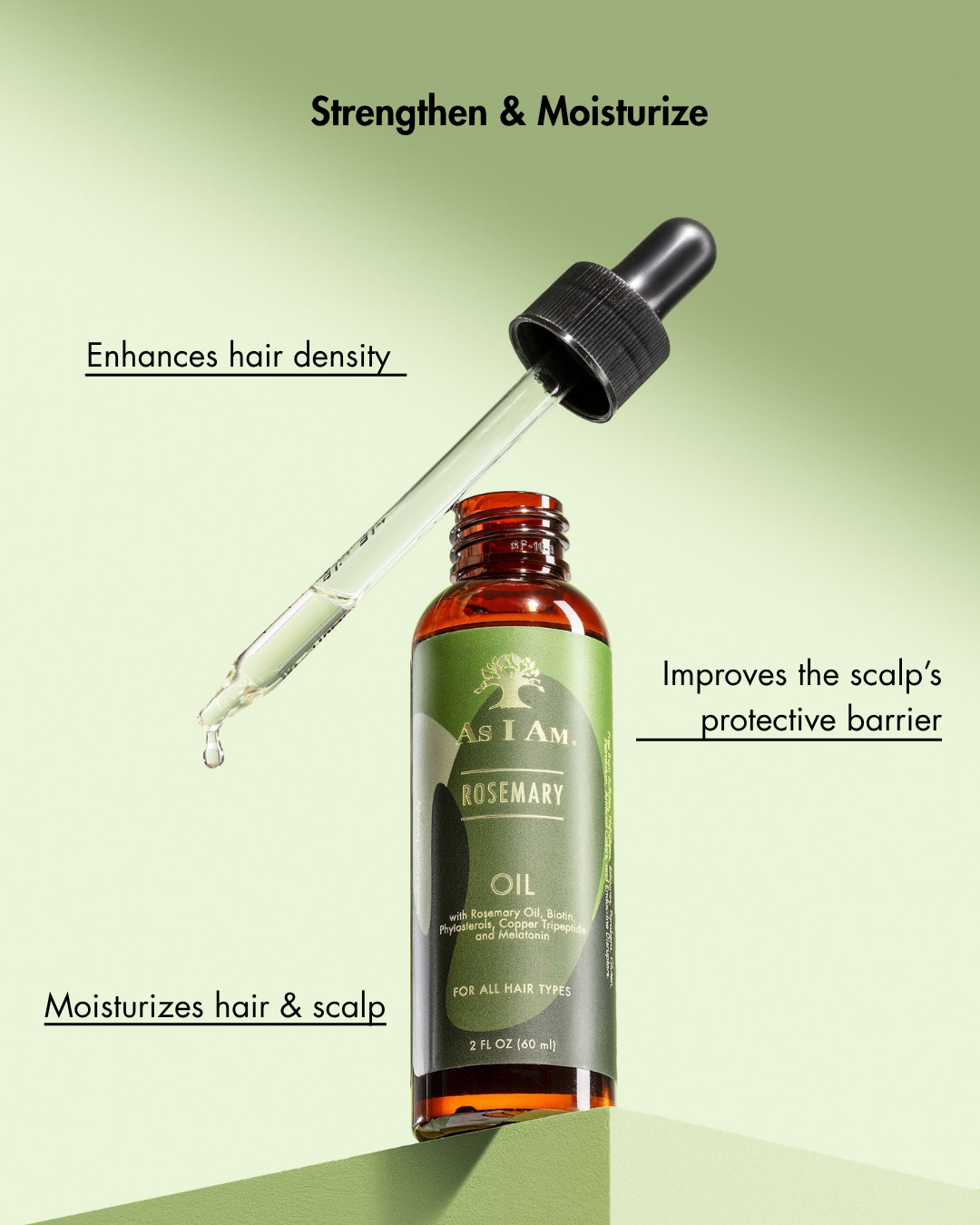 Rosemary oil bottle with dropper on a green background