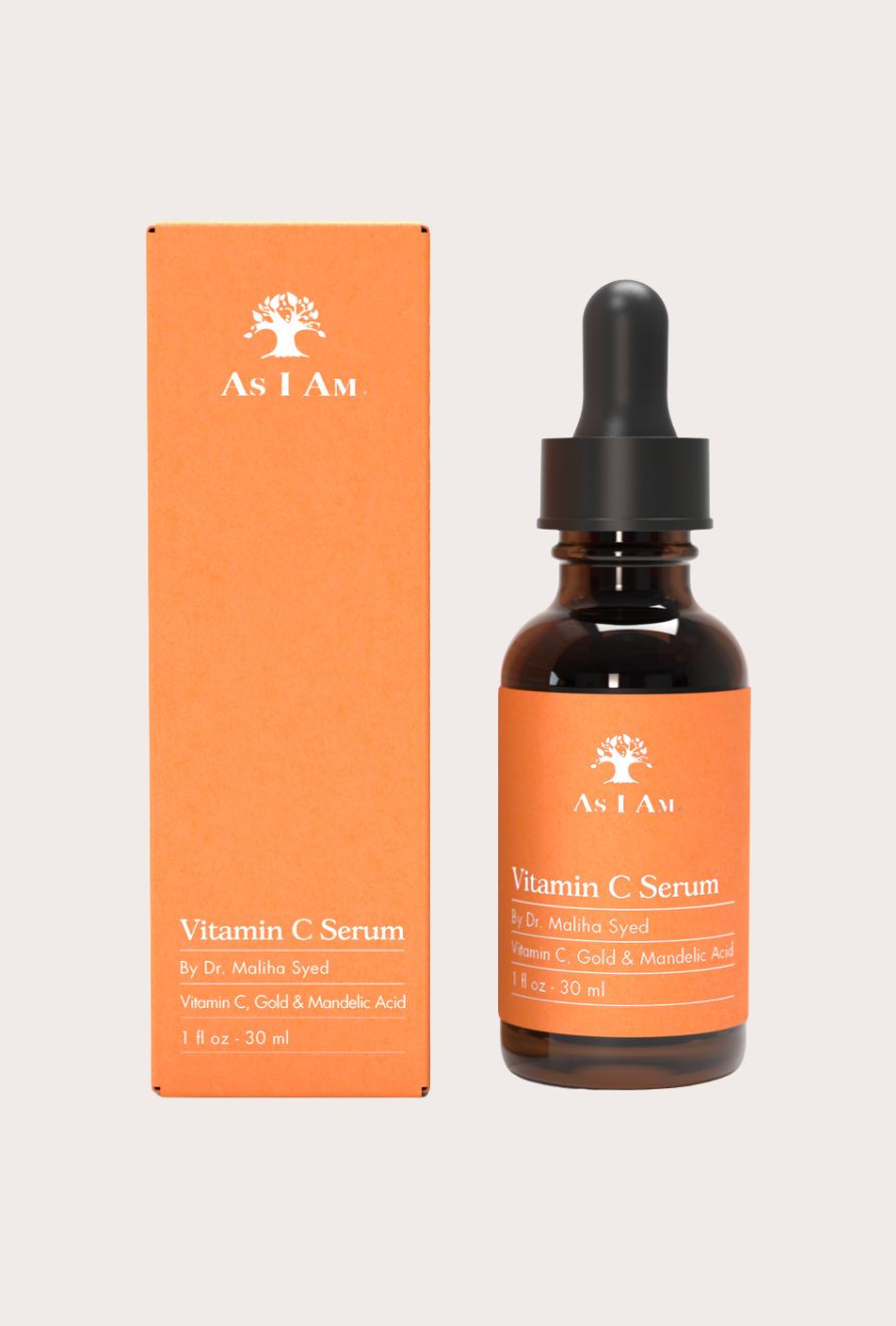 Vitamin C serum bottle with dropper and packaging on a white background