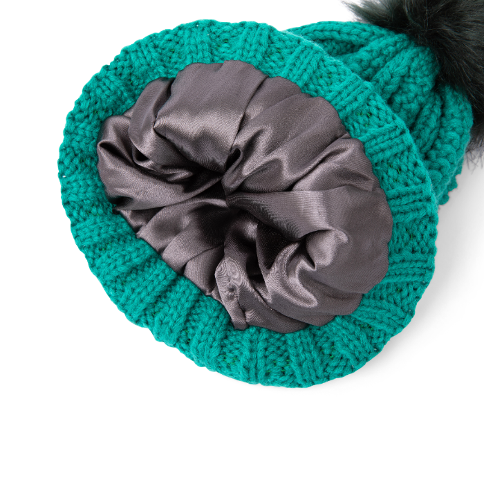 Ski Club Satin-Lined Beanie in Green, designed for warmth and hair protection with a smooth satin lining
