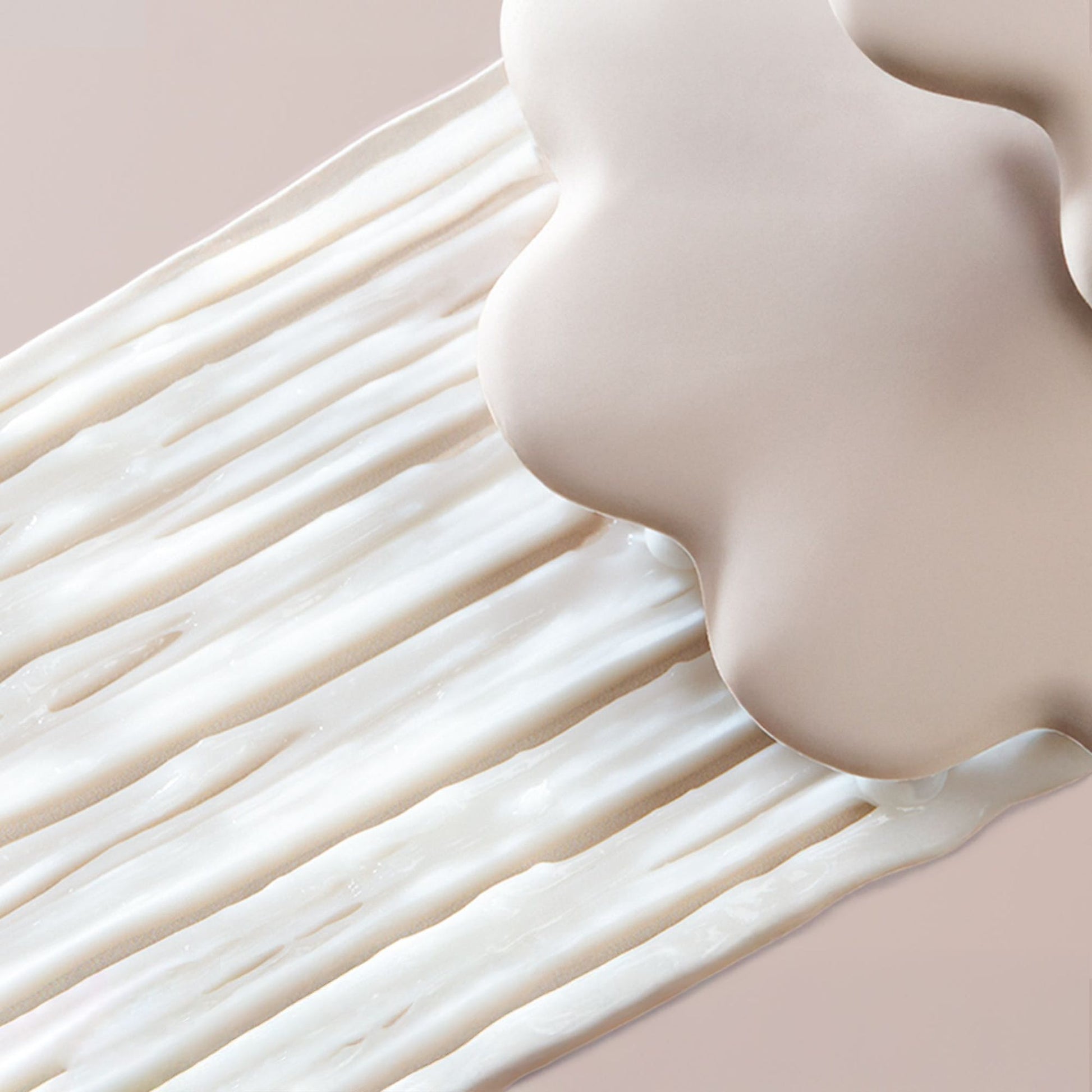 Close-up of a smooth, beige-colored surface with a soft focus effect.