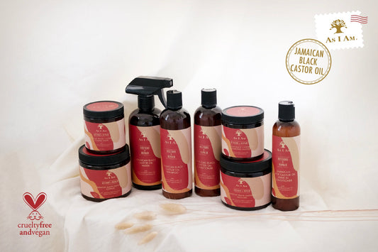 Collection of Jamaican Black Castor Oil products on a white background with Astia logo.