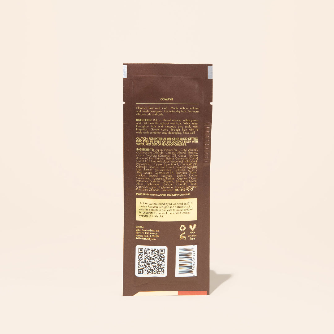 AS I AM Coconut CoWash in a 1 oz sachet, with a creamy, buttery texture—gently cleanses and conditions in one step, removing buildup while moisturizing and detangling textured hair with a refreshing coconut scent.