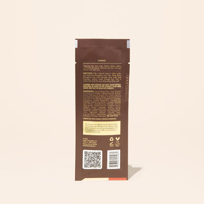AS I AM Coconut CoWash in a 1 oz sachet, with a creamy, buttery texture—gently cleanses and conditions in one step, removing buildup while moisturizing and detangling textured hair with a refreshing coconut scent.