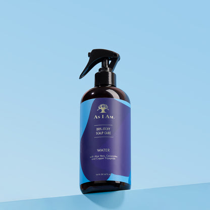 Bottle of As I Am dry itchy scalp care product on a blue background