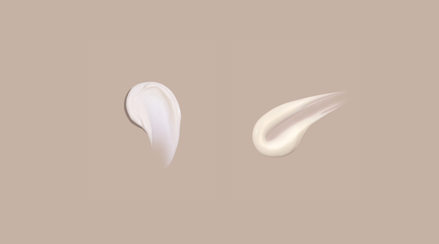 Two swatches of white cream on a beige background