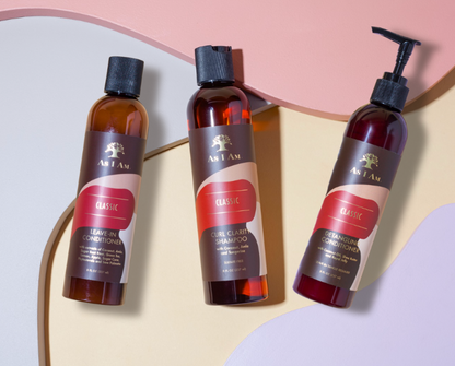 Three bottles of Aji Amor hair care products on a colorful background