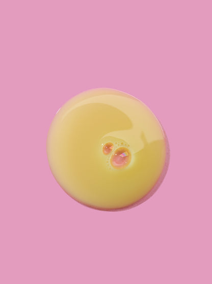 Yellow round object on a pink background