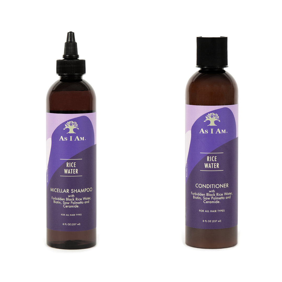 Two bottles of 'As I Am' Rice Water Shampoo and Conditioner on a white background