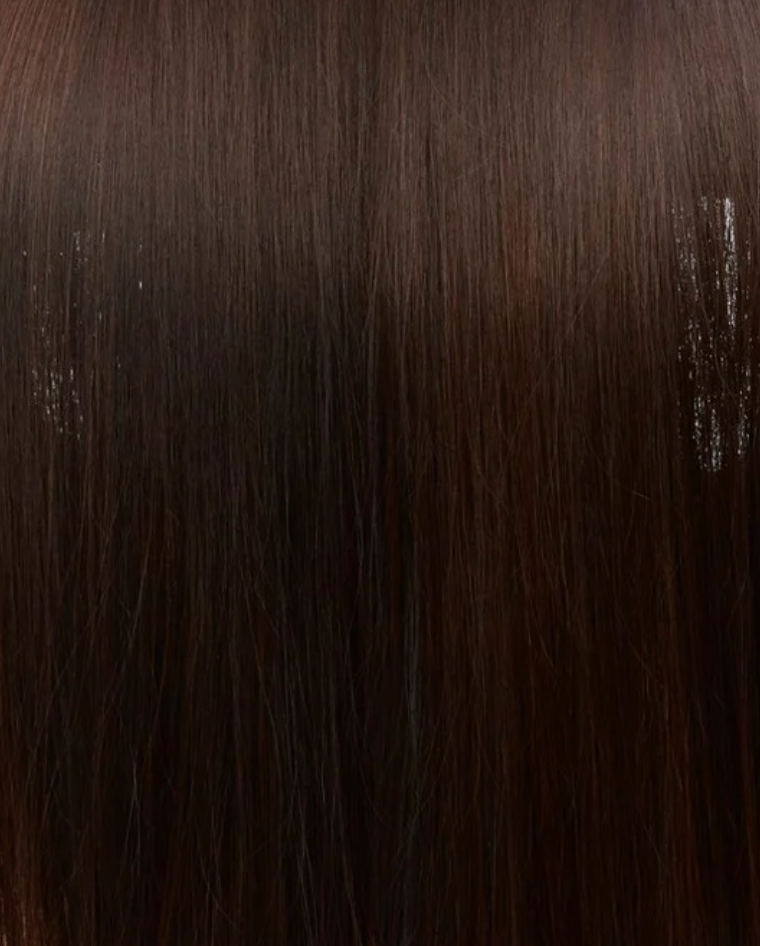 Close-up of dark brown hair texture