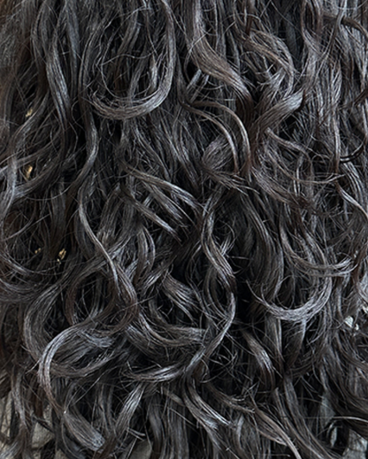 Close-up of dark hair with curls