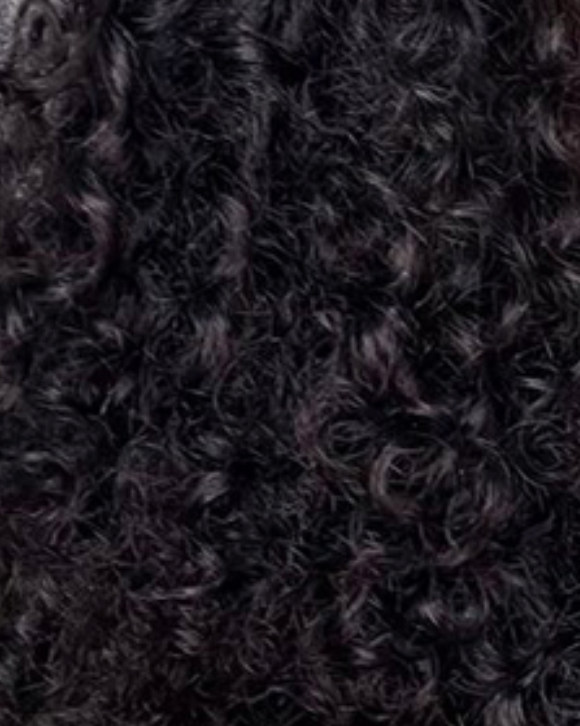 Close-up of dark curly hair texture