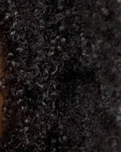 Close-up of dark textured hair